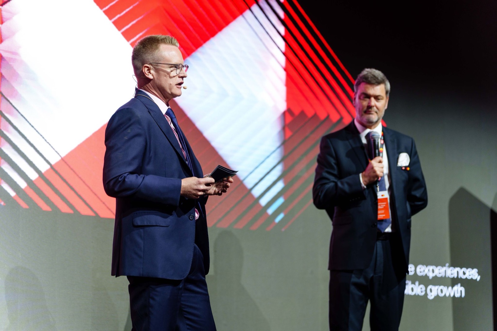 Clyde Rosanowski presenting on stage at an HSBC payments event